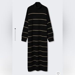 Black knitted turtle neck dress